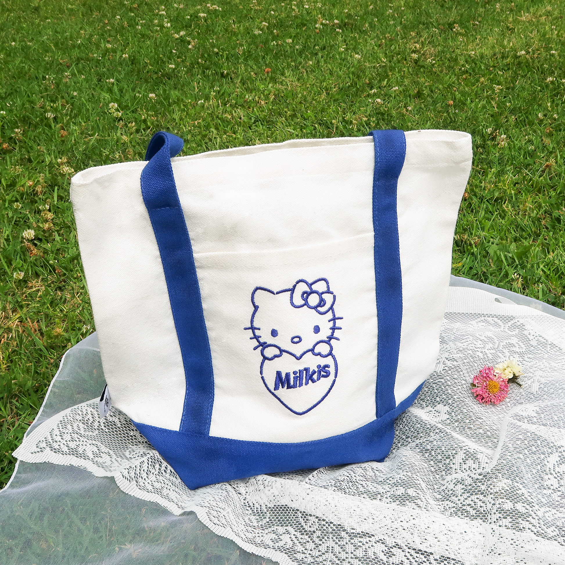 Sanrio x Milkis collaboration eco- bag on the grass
